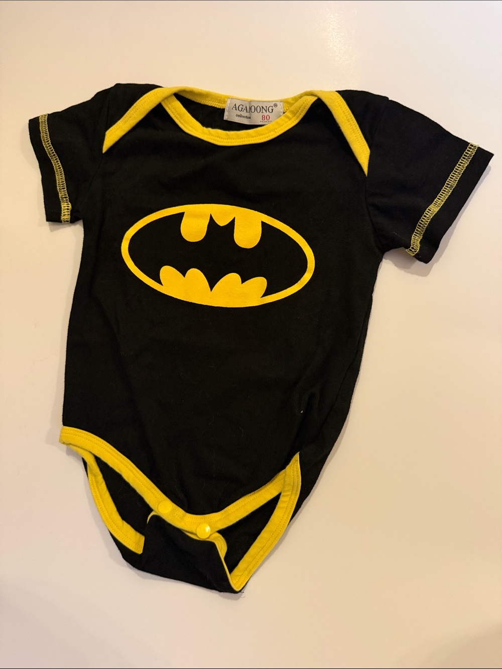 Black & Yellow Batman Logo Baby Bodysuit